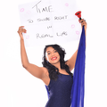 Chanelle Nundlal poses with a sign for speed dating