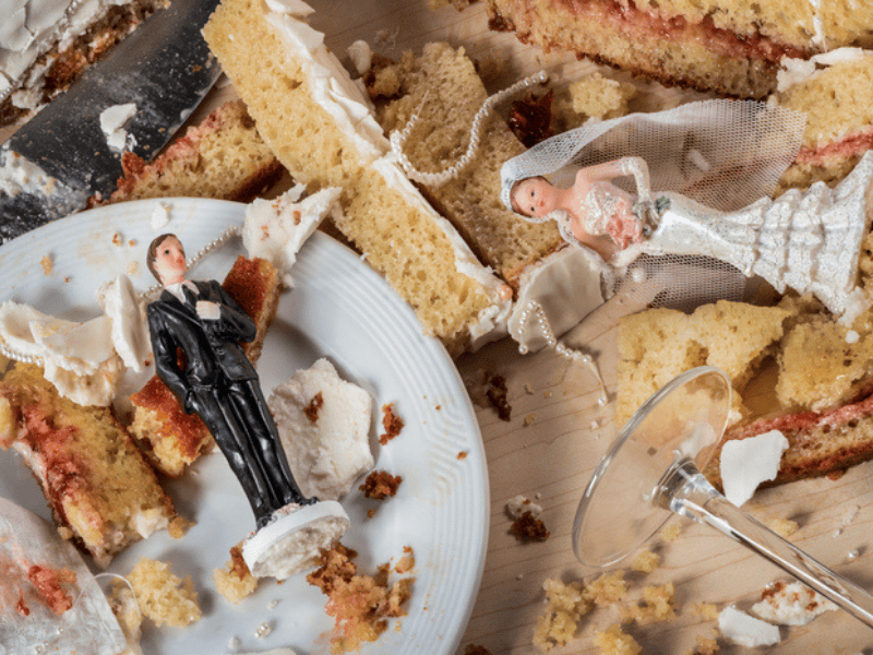 Chaos at a wedding celebration shown by the smashed cake