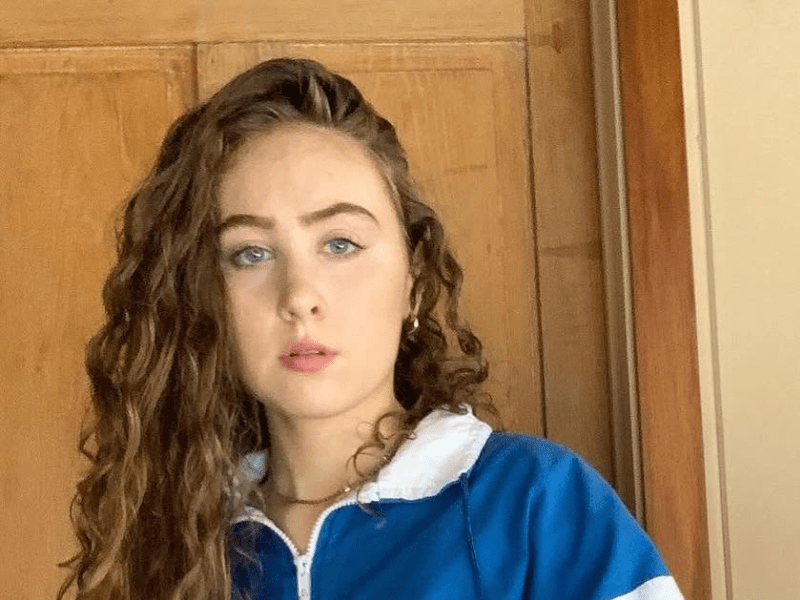 Chappell Roan with curly blonde hair