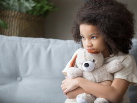 Child Mental Health Upset lonely African kid girl