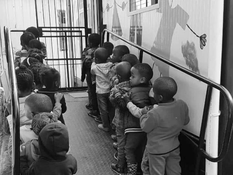 Children lining up at Thusha Bana Elementary Centre at Jehovah Jirah Orphanage Centre
