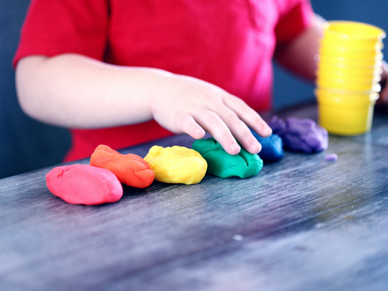 Children playing with play dough