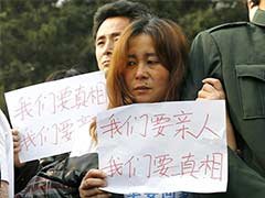 China_MH370_march_Reuters_240x180_thumb.jpg