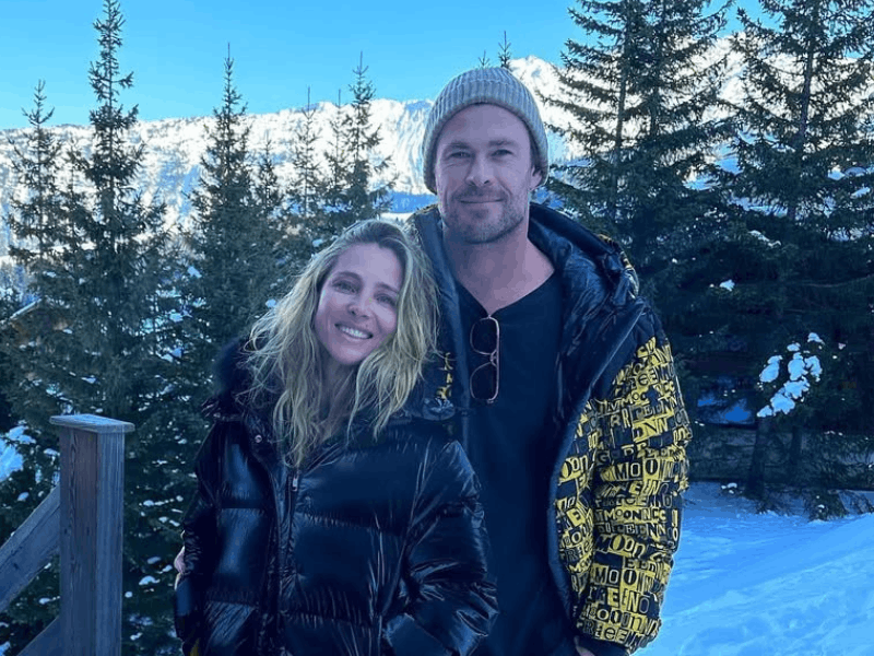 Chris Hemsworth and Elsa Pataky pose in a snowy mountain area