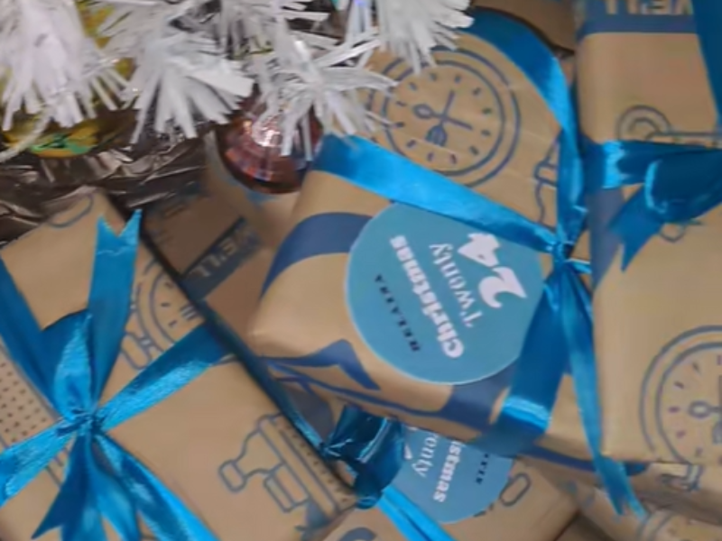 Christmas gifts wrapped in Checkers Sixty60 paper bags