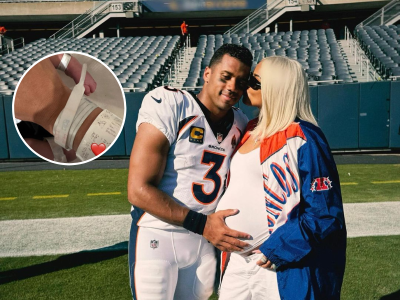 Ciara kisses her husband Russell Wilson on an NFL pitch