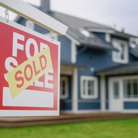 Close up of a house sold sign