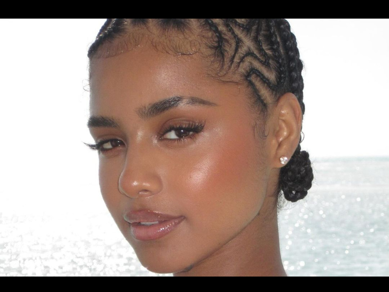 Close up picture of Tyla with her hair braided