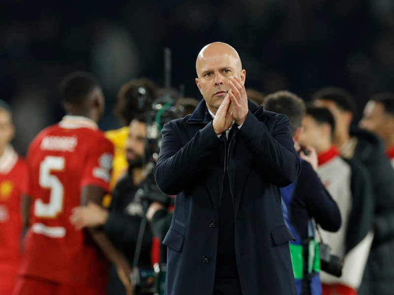 Liverpool Dutch coach Arne Slot acknowledges the supporters as he celebrates Liverpool victory