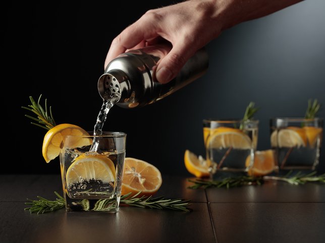 Cocktail Gin and Tonic with lemon and rosemary