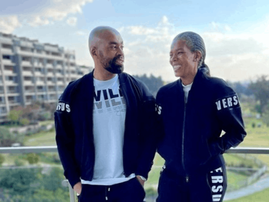 Connie and Shona Ferguson wear matching black tracksuits