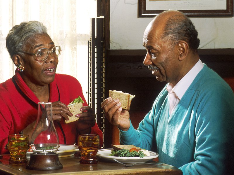 Adults eating lunch