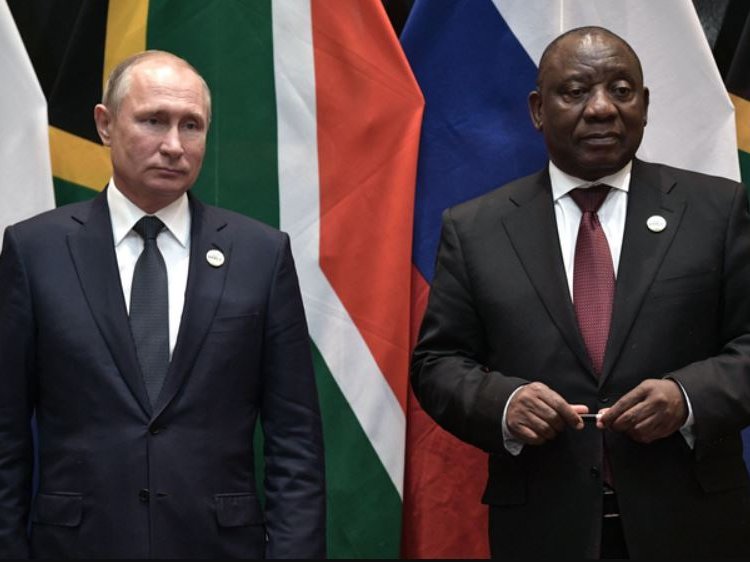 Russian President Vladimir Putin and South African President Cyril Ramaphosa attend a signing ceremony on the sidelines of the BRICS summit .