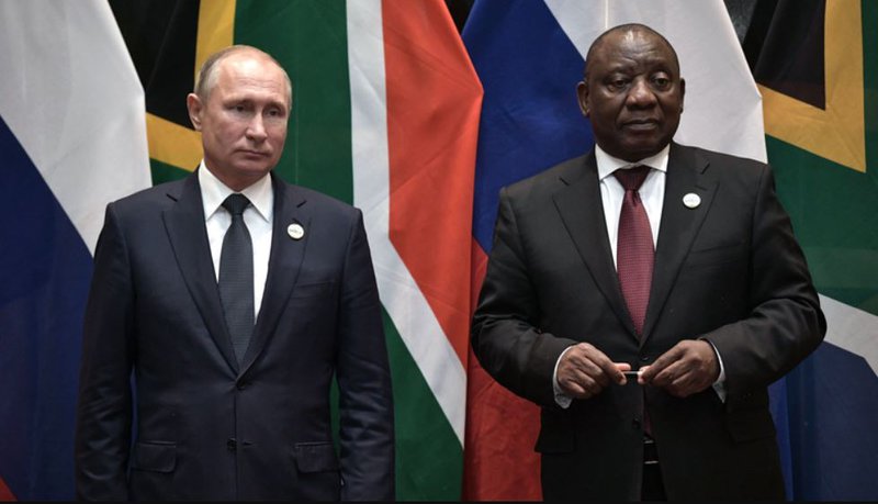 Russian President Vladimir Putin and South African President Cyril Ramaphosa attend a signing ceremony on the sidelines of the BRICS summit .