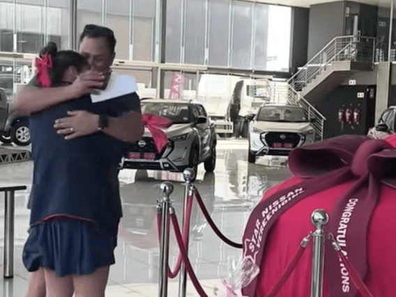 Dad surprises daughter with first car