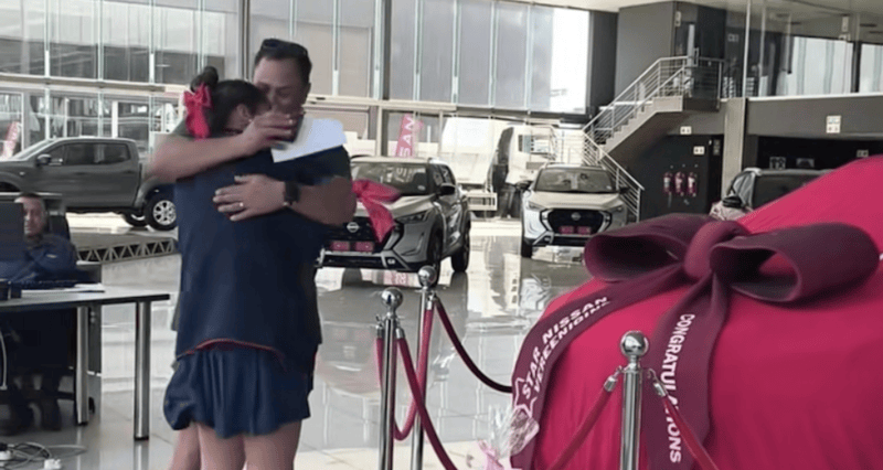 Dad surprises daughter with first car