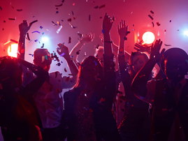 Dancing friends at a party