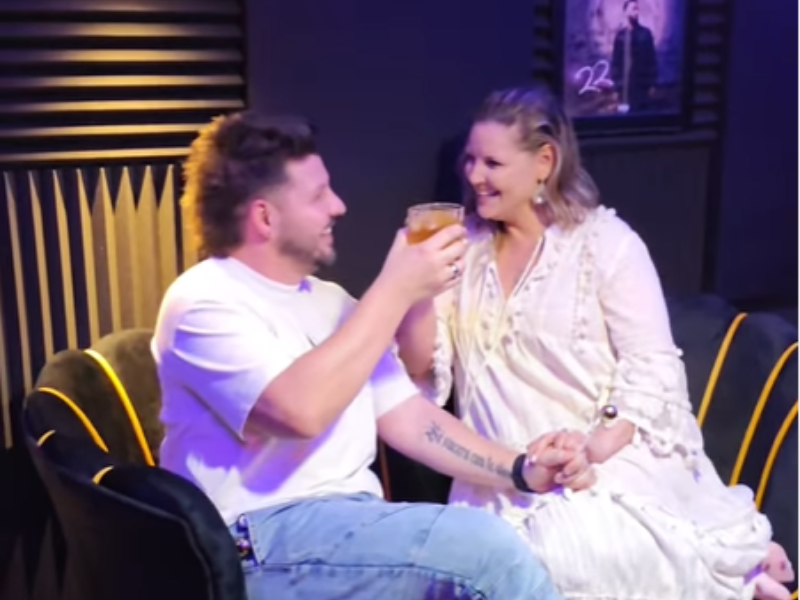 Danny Guselli and Liesl Coppin cheer to their new home studio