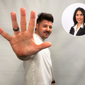 Danny Guselli holding his hand up showing five fingers for five tips