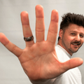 Danny Guselli holds up his hand