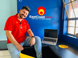 Danny Guselli sits inside a computer lap at Siphesihle High School