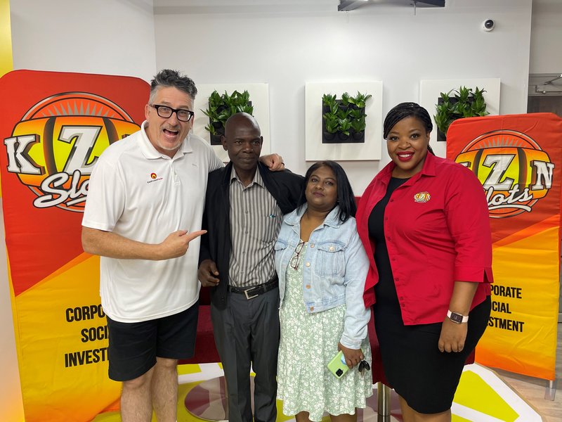 Darren with Bheki, Pravashini Nayager and KZN Gaming Slots General manager.