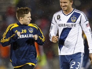 David-Beckham-120930-WithSonBrooklyn-G-300.jpg