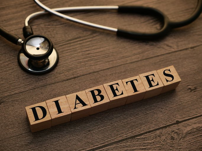 Diabetes text words typography written with wooden letter