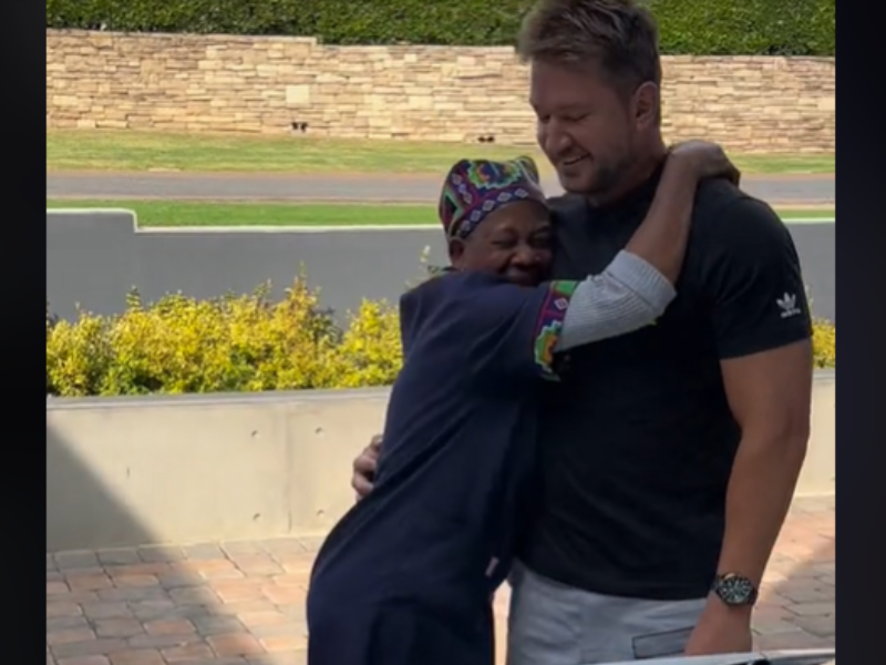 Domestic worker hugging her boss