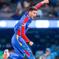 Durban Super Giants cricket player jumping in the air