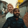 Ed Sheeran and Arijit Singh riding a scooter