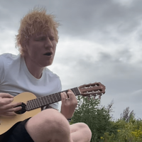 Ed Sheeran playing a guitar