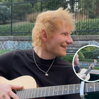 Ed Sheeran playing the guitar on a boat