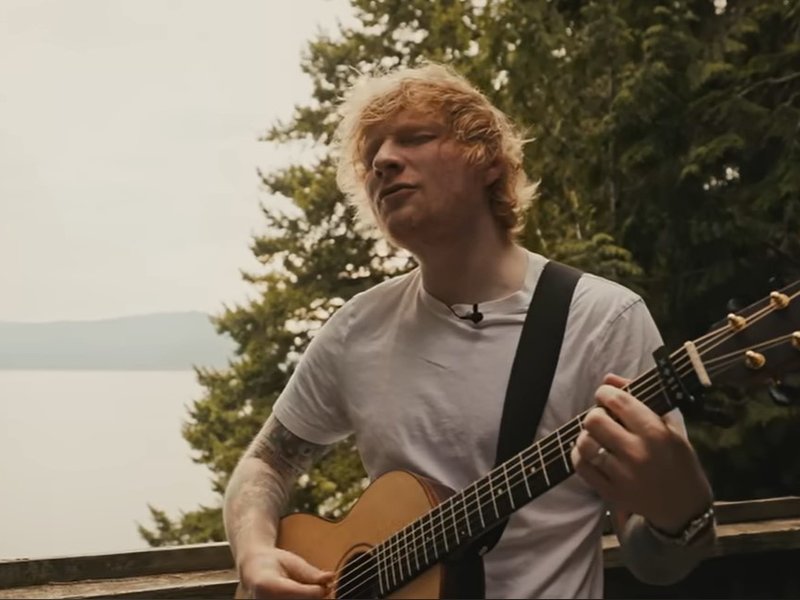 Ed Sheeran playing the guitar
