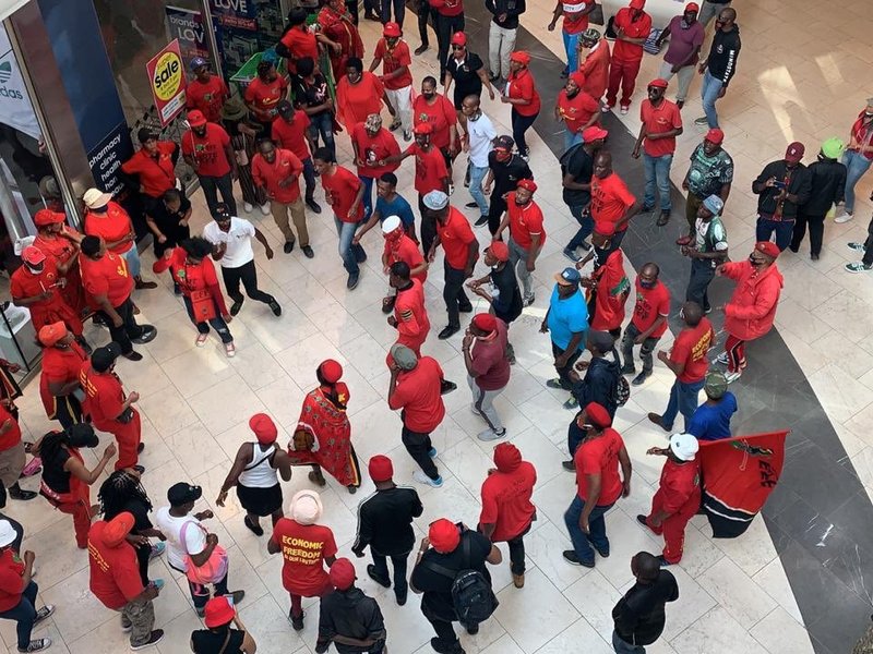 EFF protests ourside store
