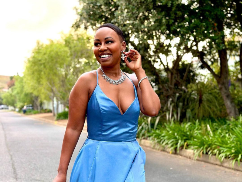 Elana Afrika-Bredenkamp wearing a blue dress