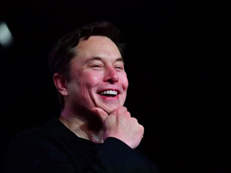 n this file photo taken on March 14, 2019 Tesla CEO Elon Musk reacts during the unveiling of the new Tesla Model Y in Hawthorne, California. Tesla CEO Elon Musk sold more than $6.9 billion worth of shares in the electric carmaker this week, according to r