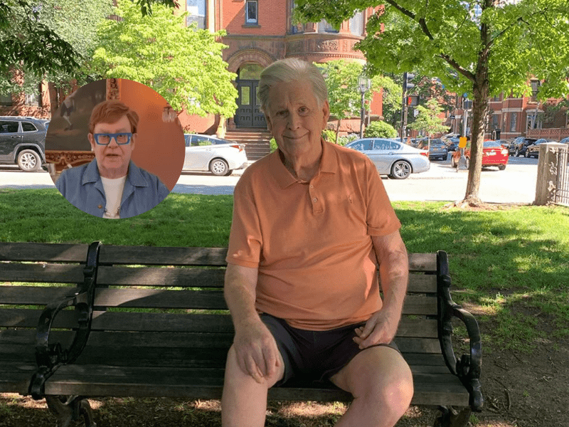 Brian Wilson sitting on a bench
