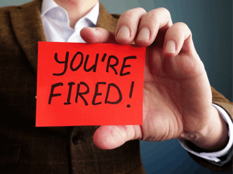 Employer shows red card with you are fired text