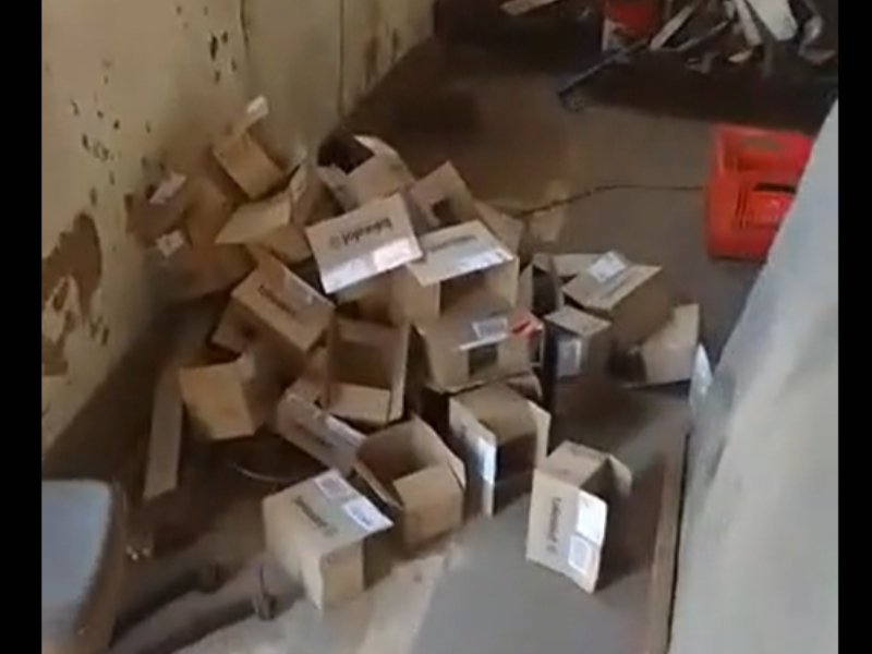 Empty boxes lying on a workshop floor