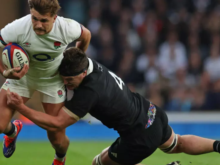 England's Henry Slade in action against New Zealand