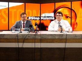 AfriForum's Ernst Roets is seated next to lawyer Daniel Eloff