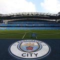 Manchester City badge at the club's Etihad Stadium