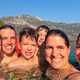 Family take a selfie whilst in the water swimming