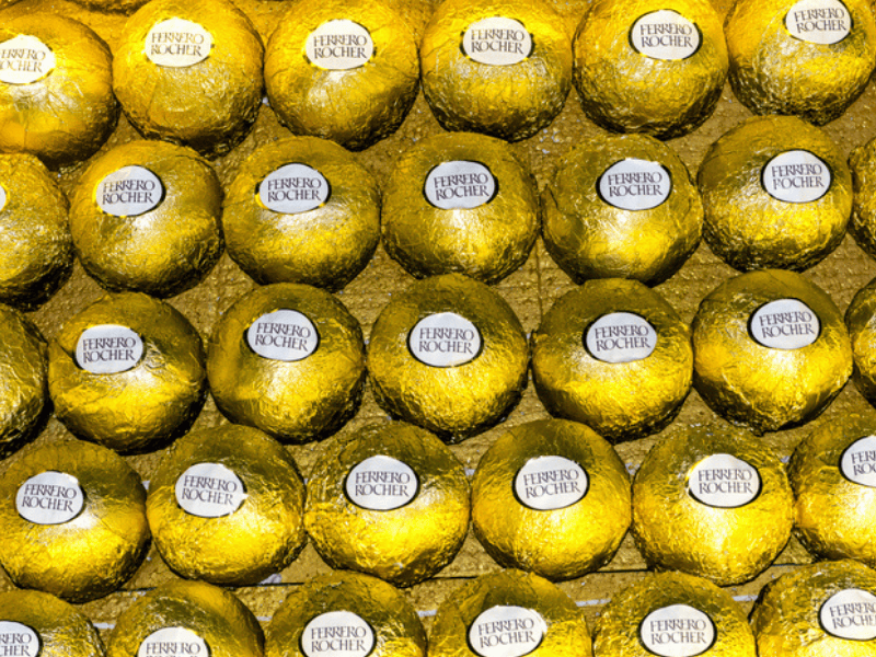 Ferrero Rocher chocolates wrapped up and neatly packed close together