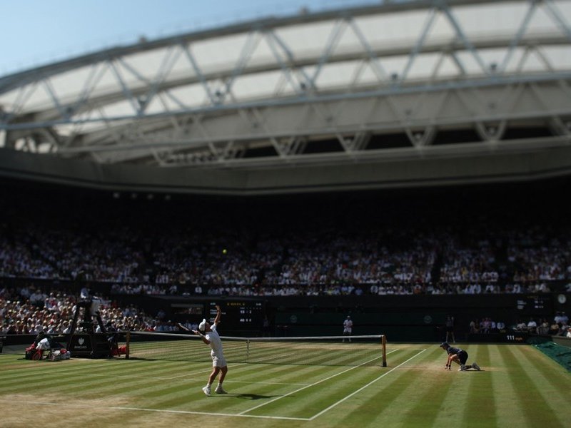 Britain's Arthur Fery serves on Centre Court at Wimbledon 2026