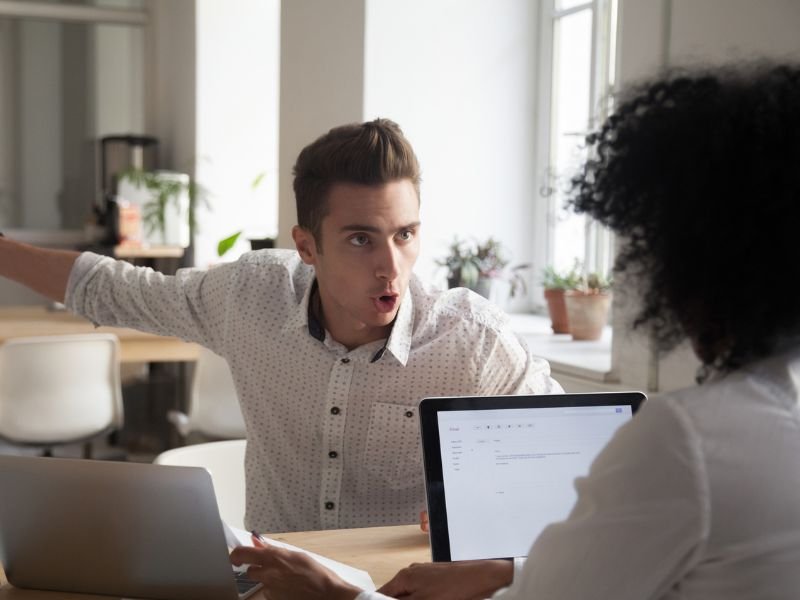 Arguing at office stock image