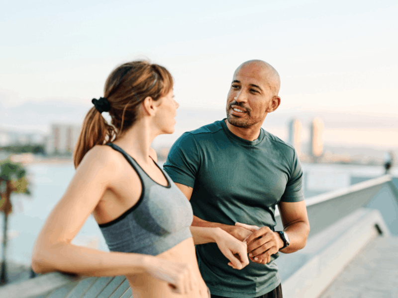 Fitness woman and man out on a run