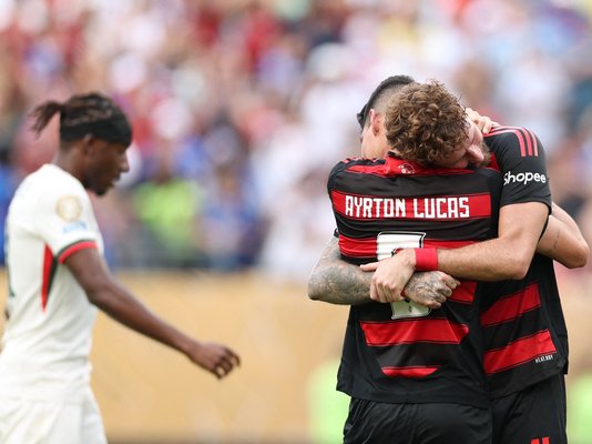 Flamengo Brazilian defender Ayrton Lucas and Flamengo Brazilian defender Leo Pereira celebrate their victory
