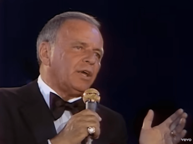 Frank Sinatra wearing a black bow tie